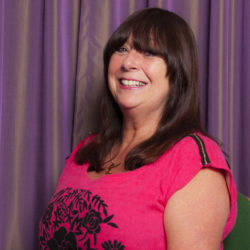 Headshot of Linda Algie who has long dark hair and wears a pink top. Headshot of Linda Algie who has long dark hair and wears a pink top.