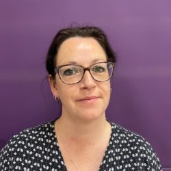 headshot of Susan McKenna - Susan has dark hair, tied back and wears glasses. headshot of Susan McKenna - Susan has dark hair, tied back and wears glasses.