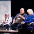 GDA members on stage at a conference