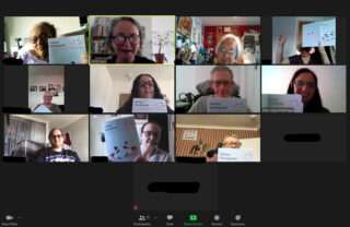 Group of GDA members on zoom learning italian - holding up their italian language textbooks with their tutor from lingo flamingo