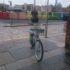 Abandoned bike in the middle of a pavement