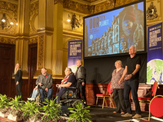 The PPPs perform on stage at the City Chambers.