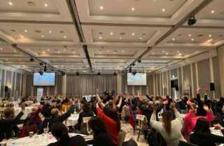 GDA members fill a large room