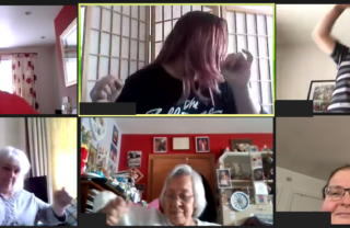 6 GDA members on a Zoom call together take part in an online Dance workshop. Everyone is in the middle of busting some dance shapes!